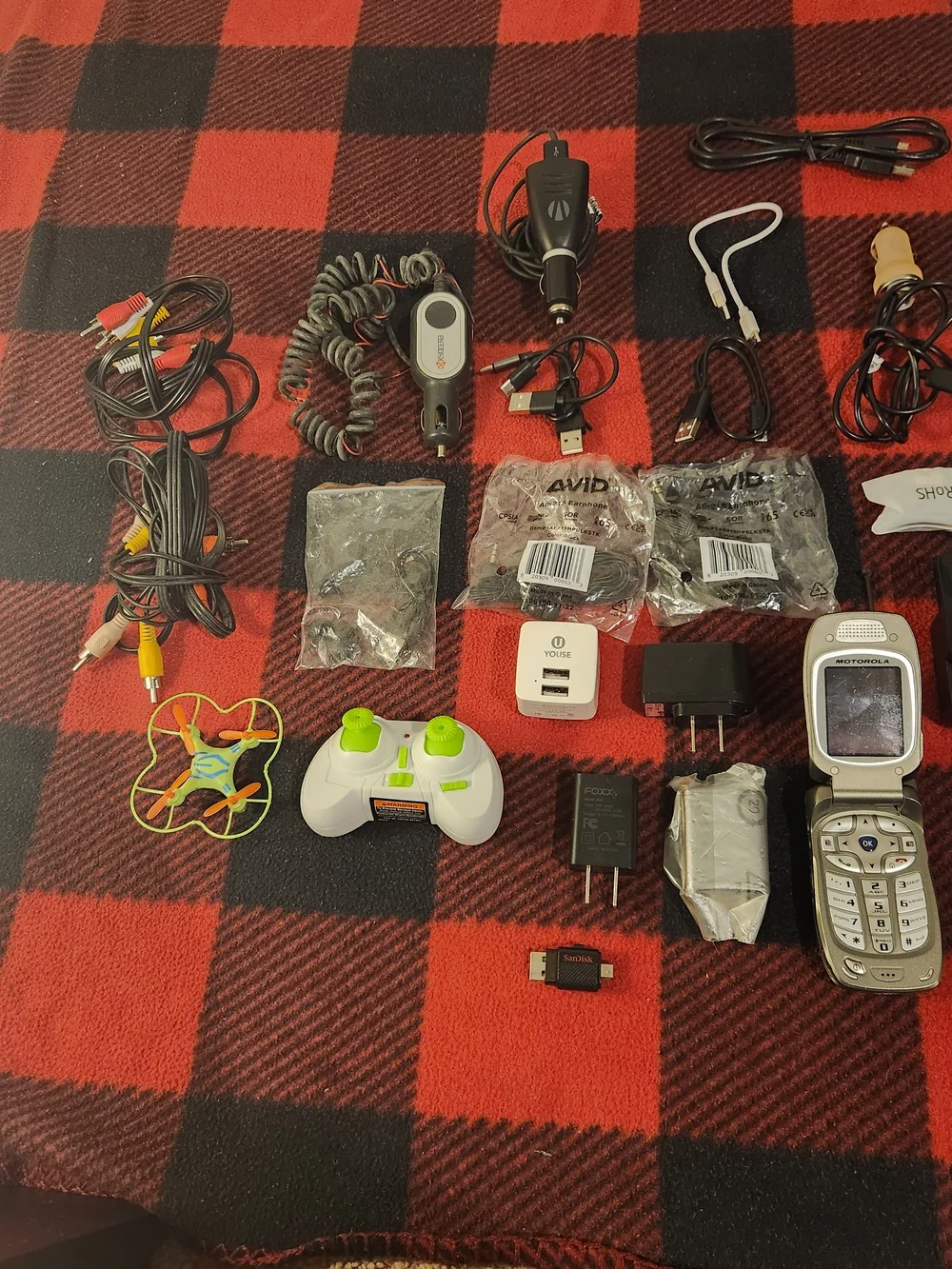 Elctronics Lot, Cellphones, Charging Cords, Remotes, And More